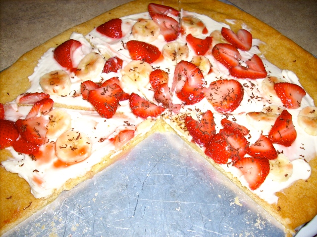 Sweet pizza with strawberries and bananas
